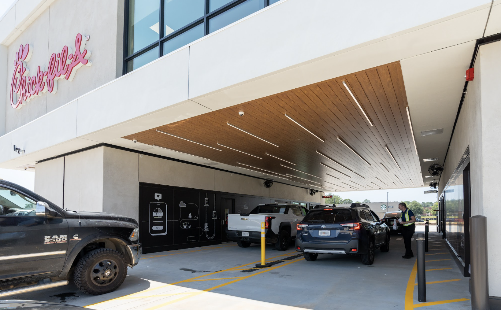 The kitchen sits above four drive-thru lanes.